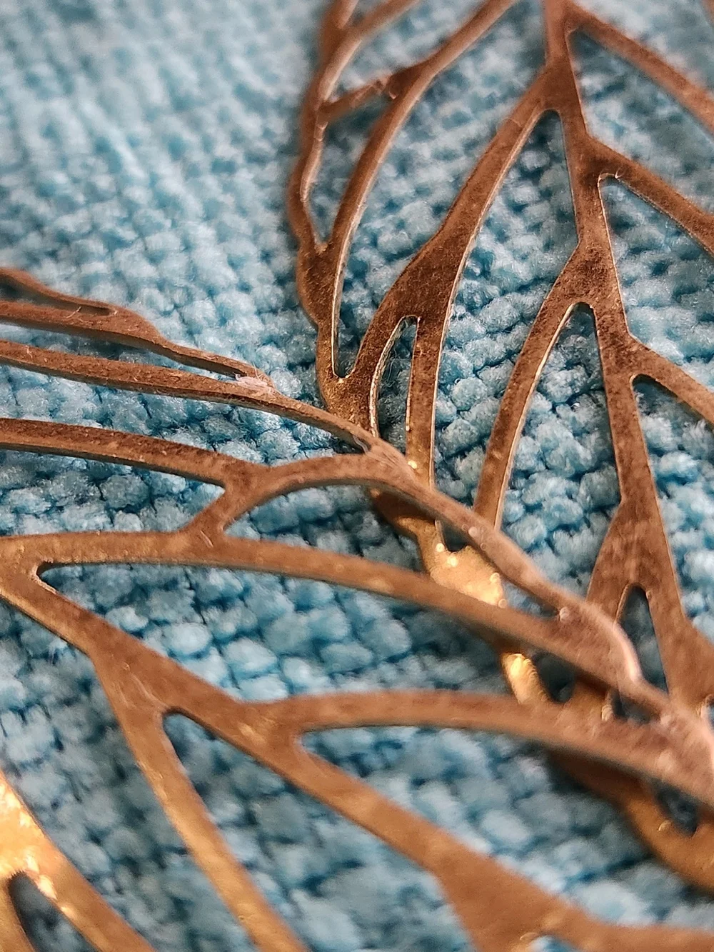 Delicate Cutout Leaf Dangle Earrings — Metallic Bronze